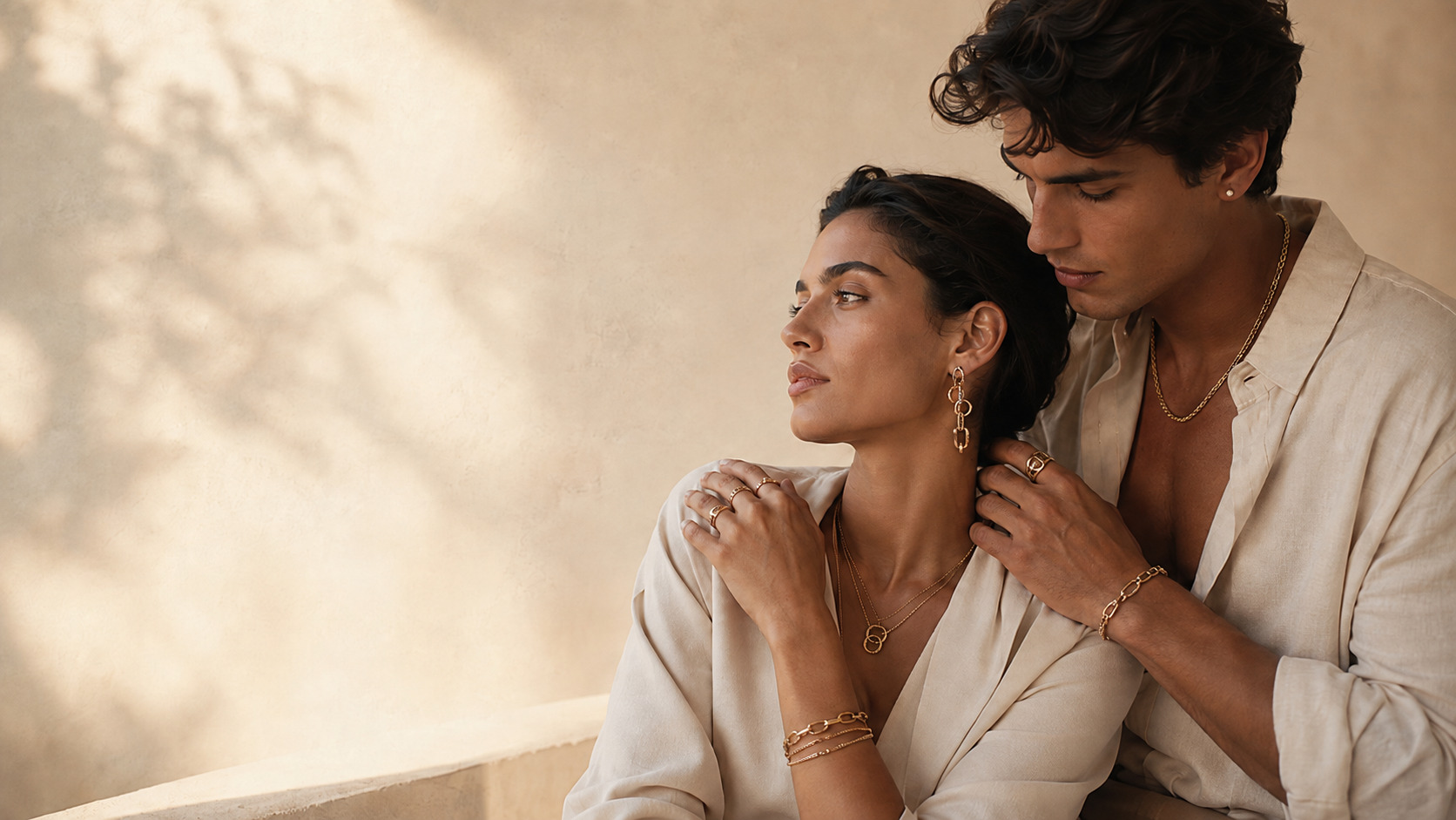Gemma and Kalā campaign: two people wearing layered jewellery